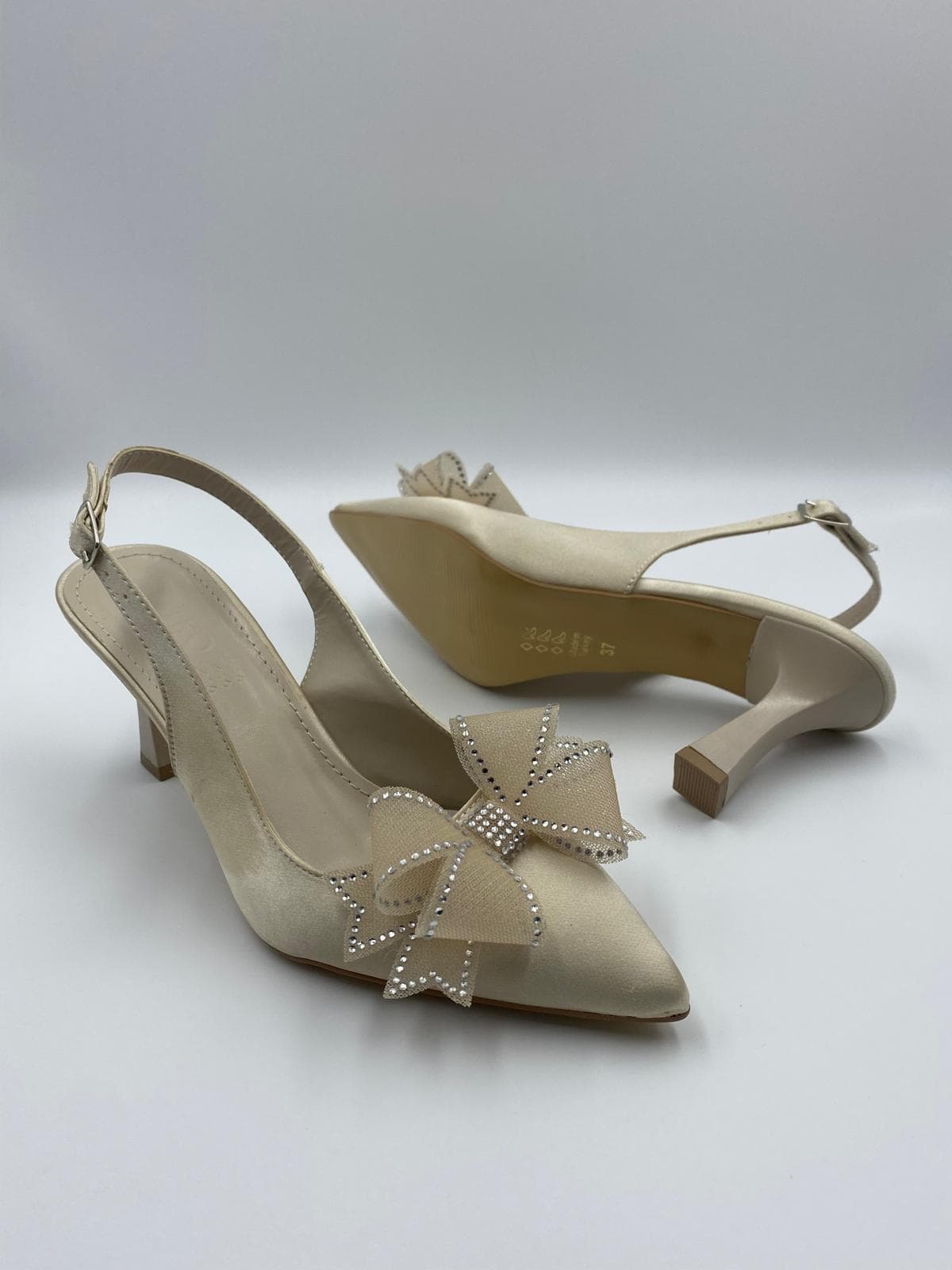 kocak-shoes-krem-saten-fiyonklu-topuklu-ayakkabi-romantik-ve-zarif-dokunus-t0025